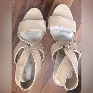 Size 9M women’s cream colored strappy heels. 4 inch heel.